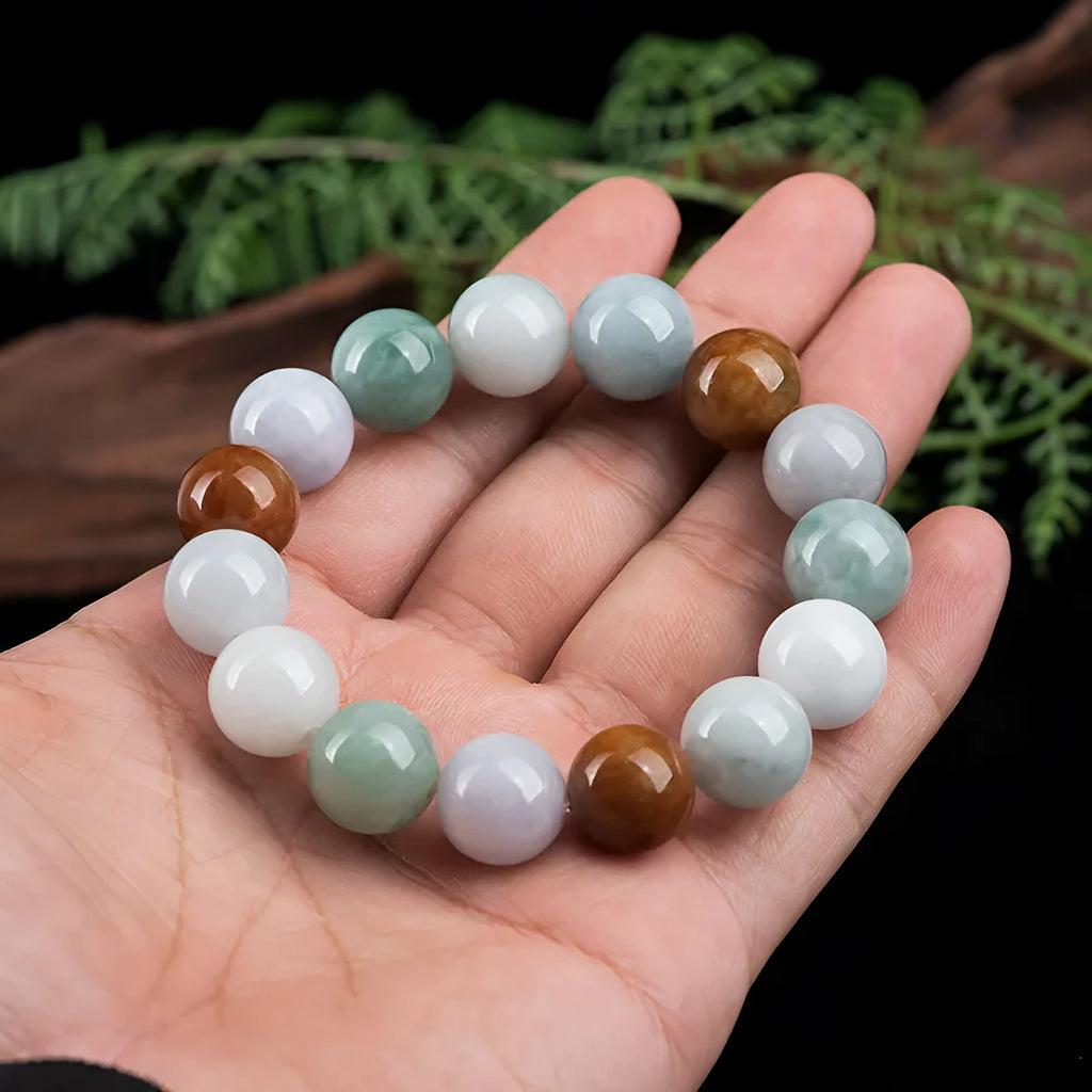 Women's bracelet with round three-colour jade beads, certificate visible.