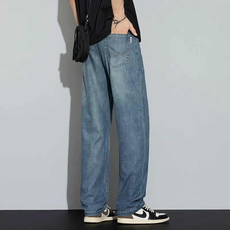 Cool-feeling ice silk jeans for men in vintage blue, denim fabric with slight stretch