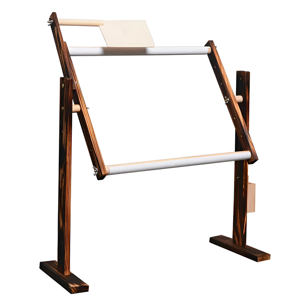 Vertical solid pine wood cross stitch embroidery frame with adjustable clamp on a desktop.