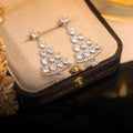 Women's silver needle Christmas tree earrings in gold and silver pair, alloy electroplated geometric shape with Christmas bell