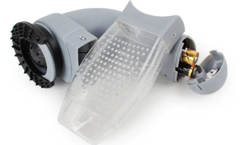 Grey portable electric pet hair remover vacuum with soft rubber grooming head for dogs and cats.
