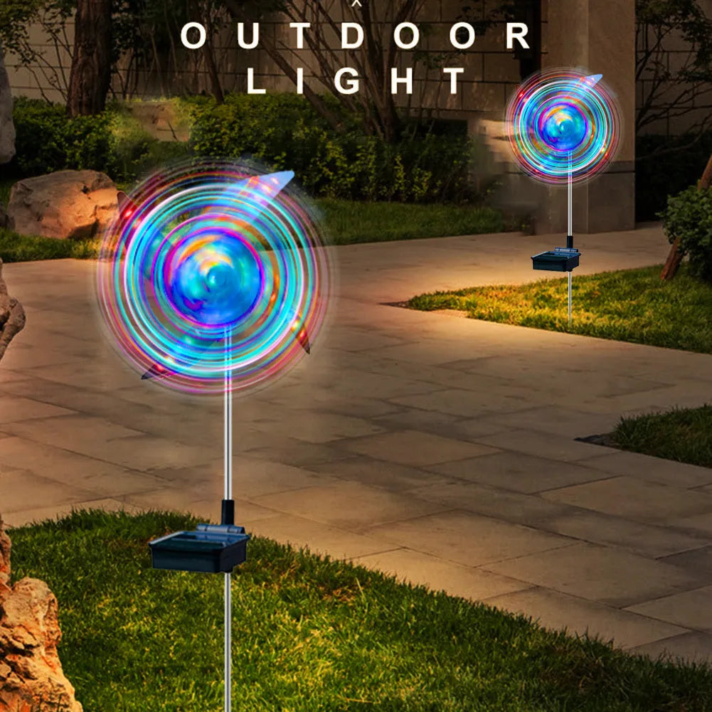 Solar wind spinner garden light with spinning pinwheel and LED illumination for outdoor path decoration