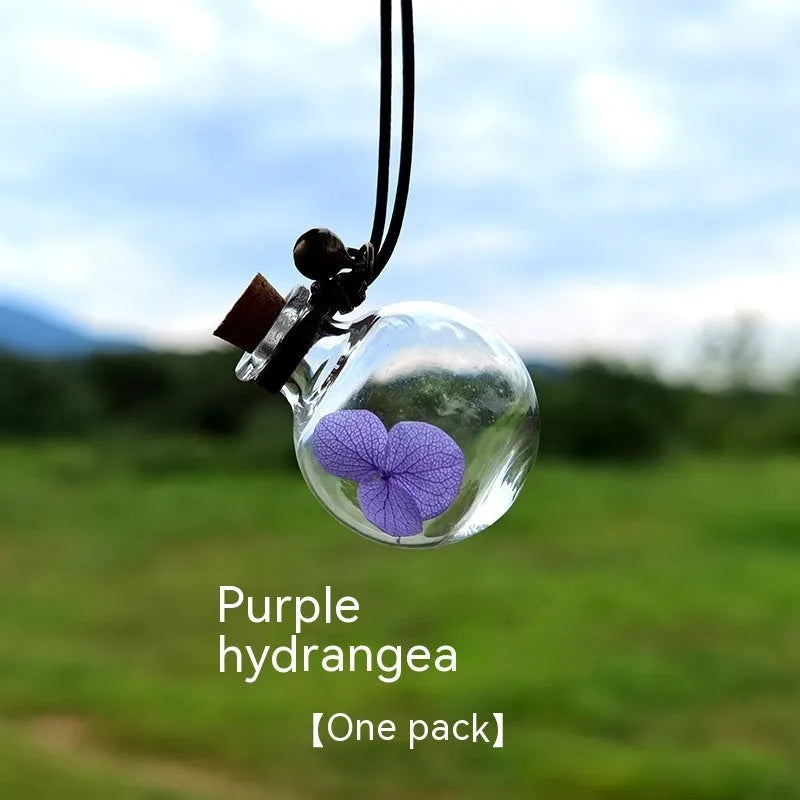 Glass car perfume pendant with preserved flowers for interior decoration and air freshening