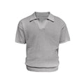 Man wearing a creamy white striped loose fit short sleeve polo shirt made from ice silk fabric.