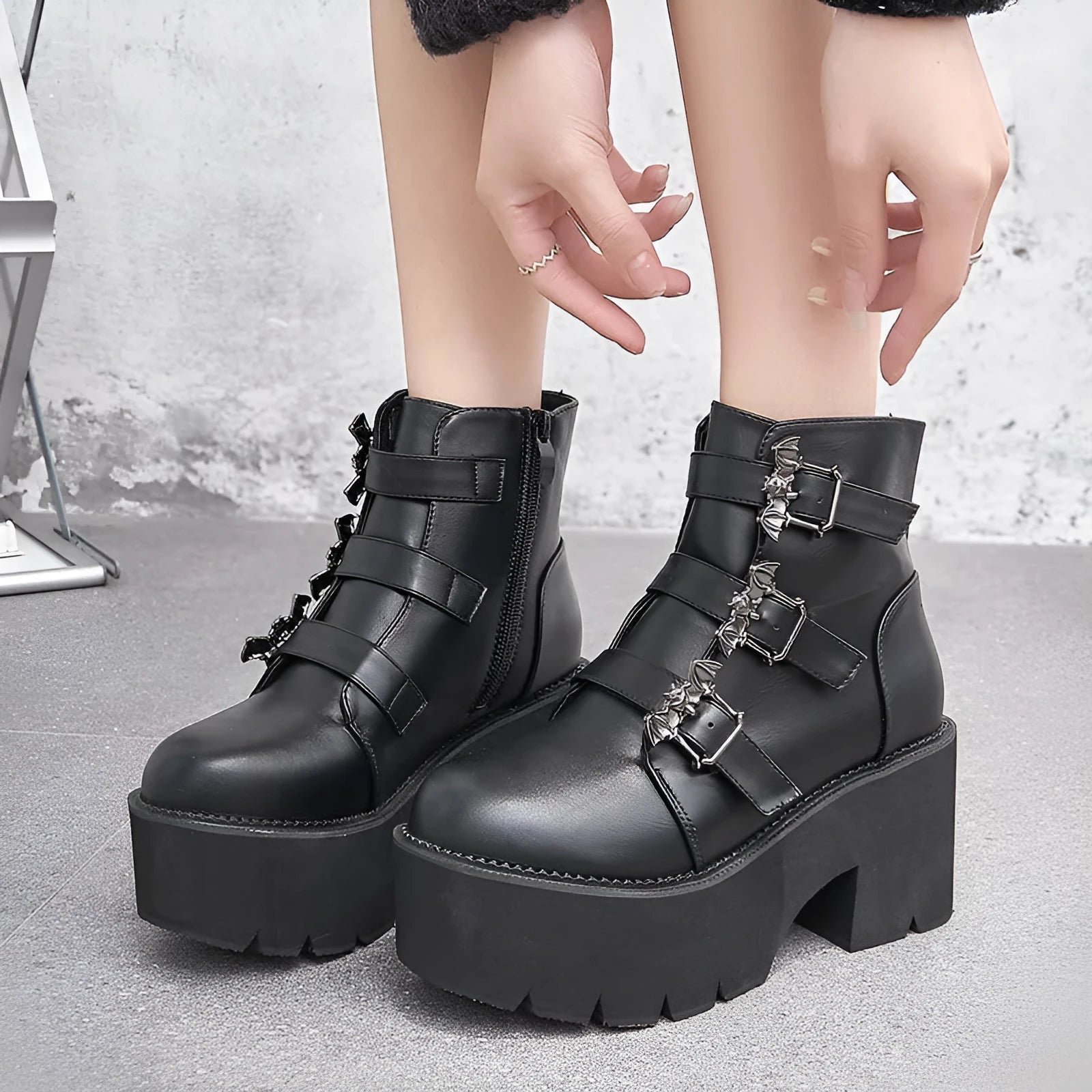 Black women's Harajuku punk-style Martin boots with a bat buckle and side zipper.