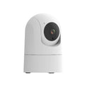 White indoor security camera with lens on a circular motorised base, showing compact size for shelf placement.