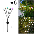 Solar-powered LED garden ground light with multiple light heads and a pneumatic foot pedal for installation.