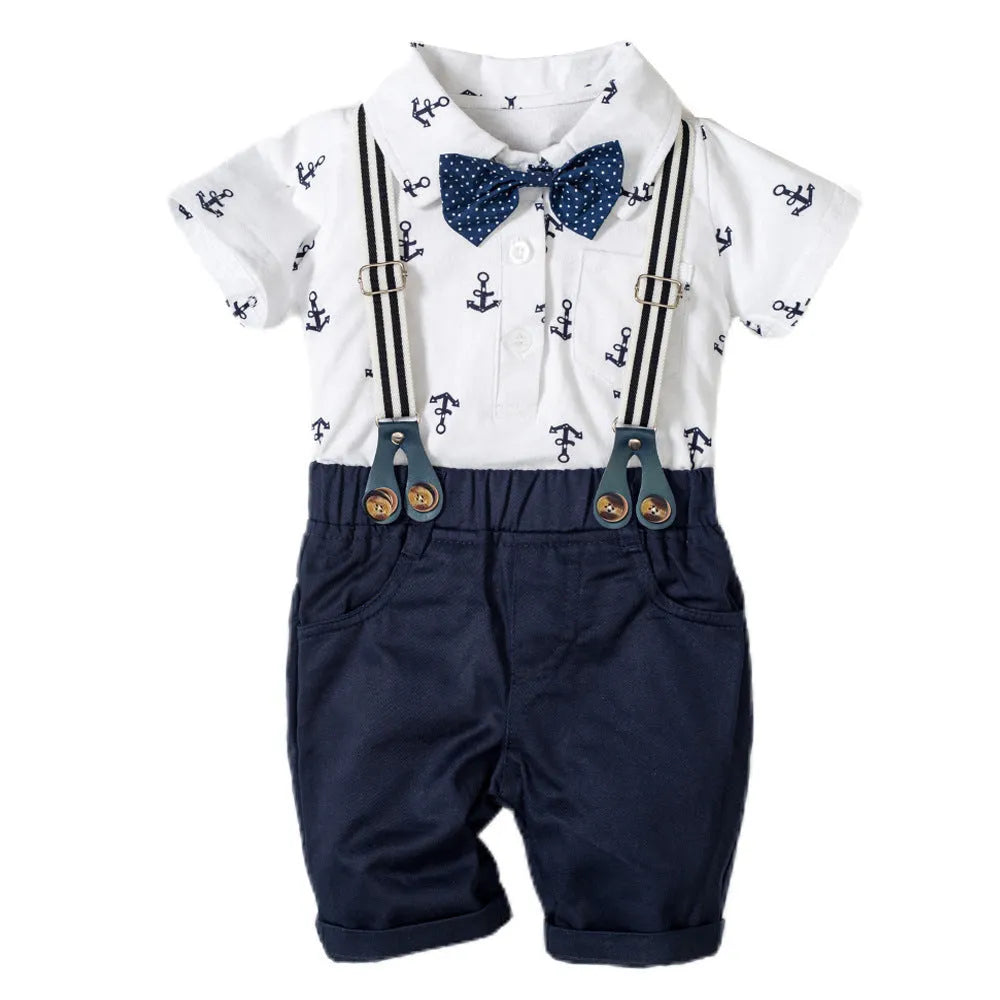 Blue and white cotton baby boy romper with triangle print and short sleeves