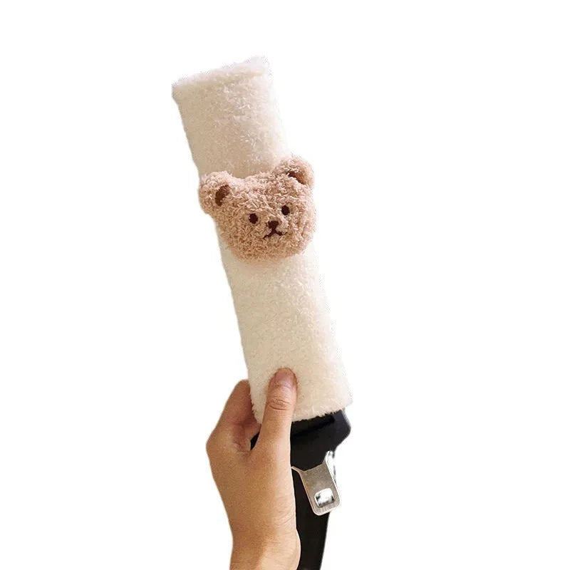 Cartoon bear plush baby car seat belt protective cover showing khaki and coffee colour options