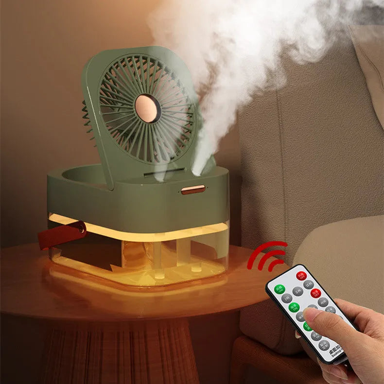 Pearl white desktop humidifier cooling fan with water tank, remote control, and night light on a wooden desk.