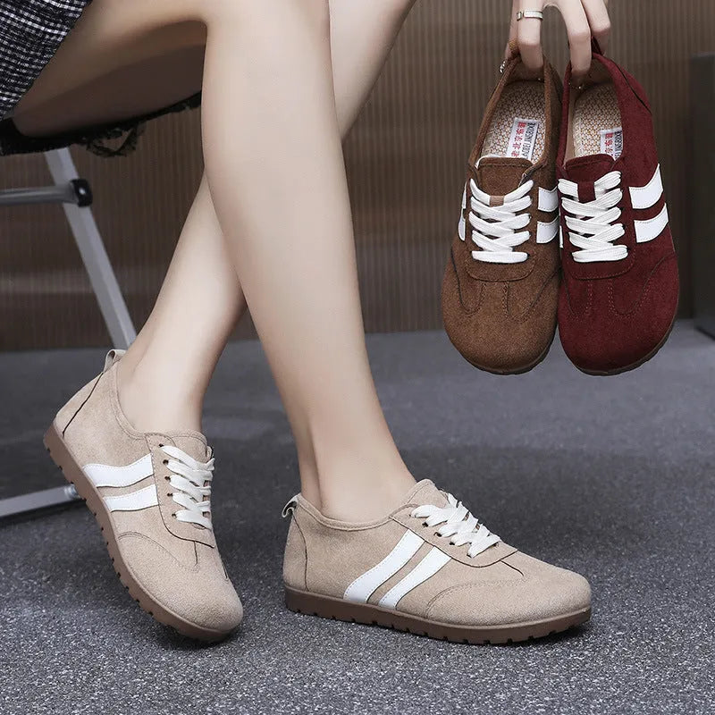 Women's vintage canvas sneakers with soft rubber soles in dark red colour