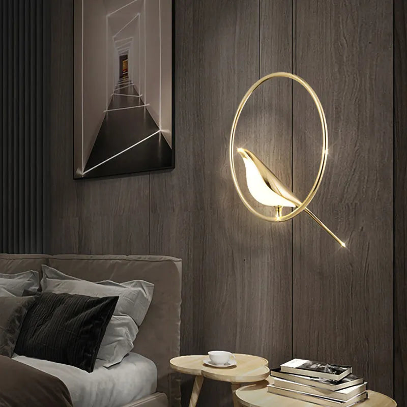 Modern linear chandelier with a minimalist metal magpie bird design and clear acrylic details, hanging 150cm long.