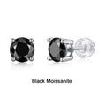 Pair of moissanite stud earrings with platinum-plated S925 silver settings, on a gift box, available in black or transparent stones