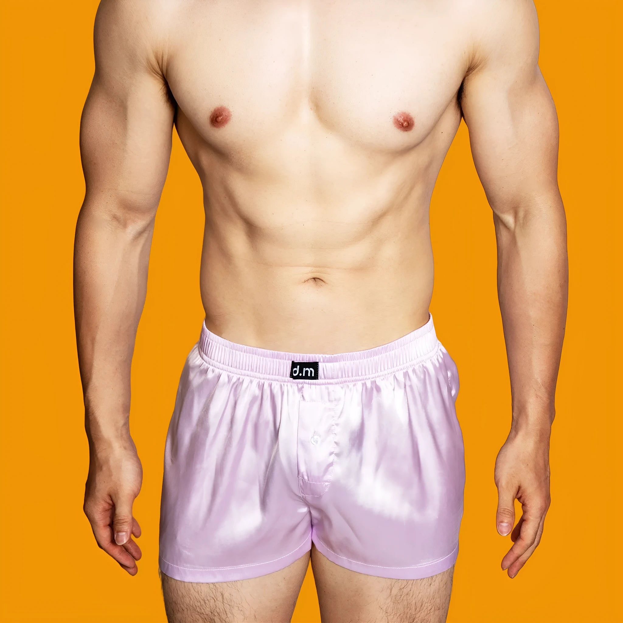 Men's low-waist silky boxer polyester pajama shorts in black brown, front view on white background