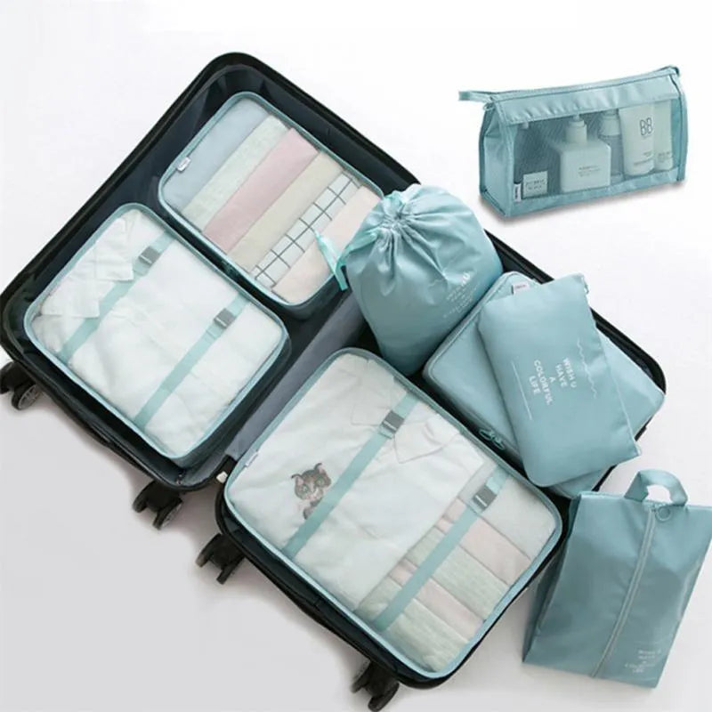 8-piece set of nylon packing cubes in assorted sizes for travel storage, featuring waterproof and dustproof material