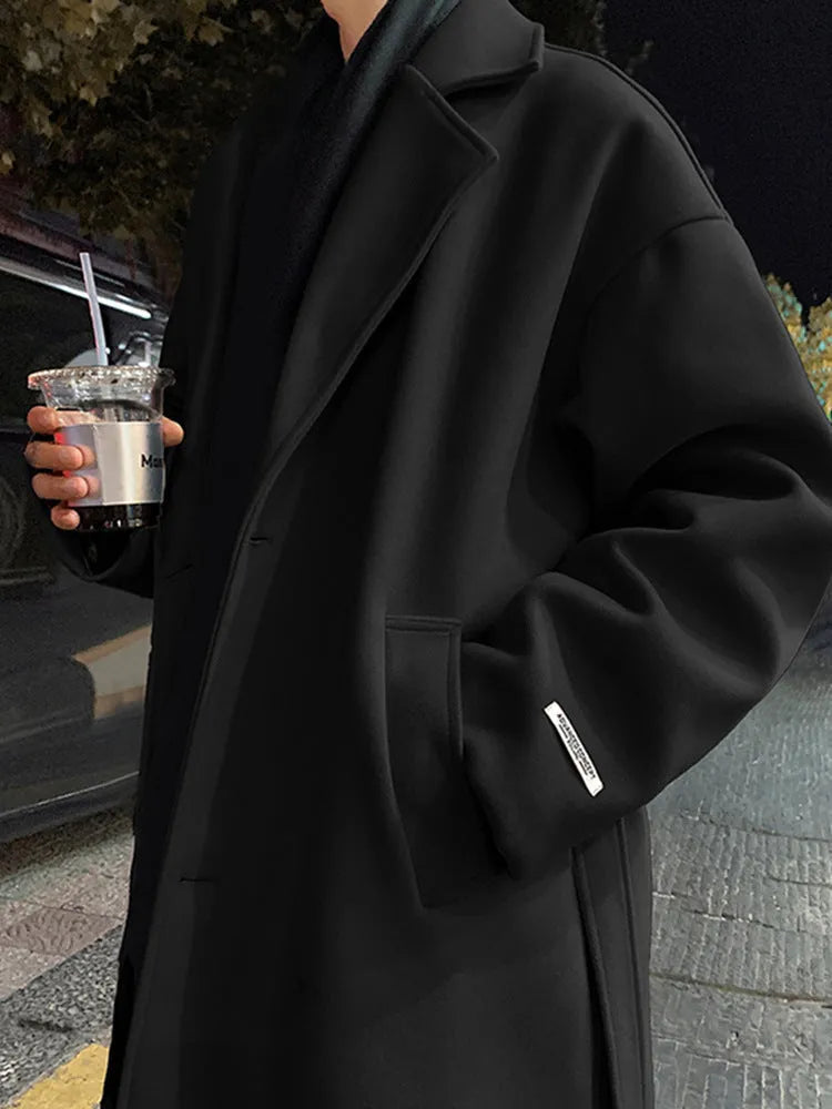 Men's mid-long wool coat in British style, black colour, with side seam pockets