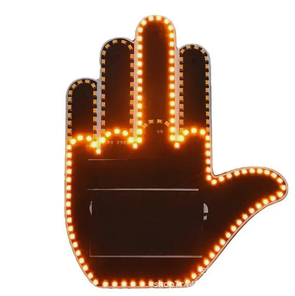 Black plastic LED gesture light for cars with remote control showing middle finger symbol