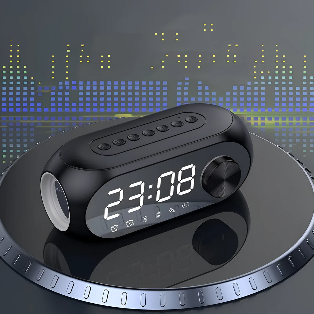 S8 Black portable USB mini clock radio with extra bass on a table.