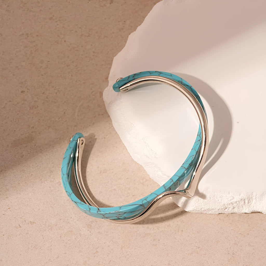 Geometry pattern twisted open-ended bracelet in 22 Silver Blue alloy with electroplated finish