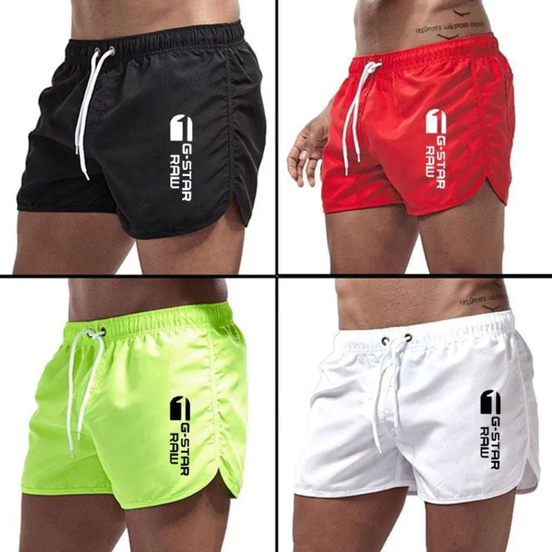 Men's thin polyester sports shorts in various colours with an elasticated waistband.