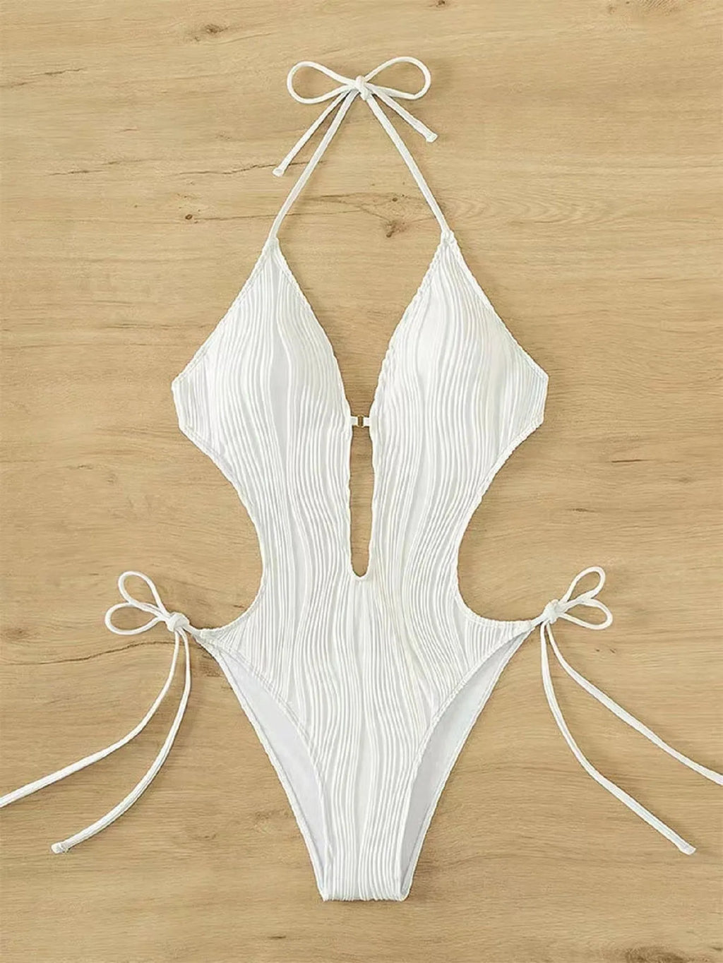 Women's black lace-up triangle bikini swimsuit with adjustable ties and solid colour design