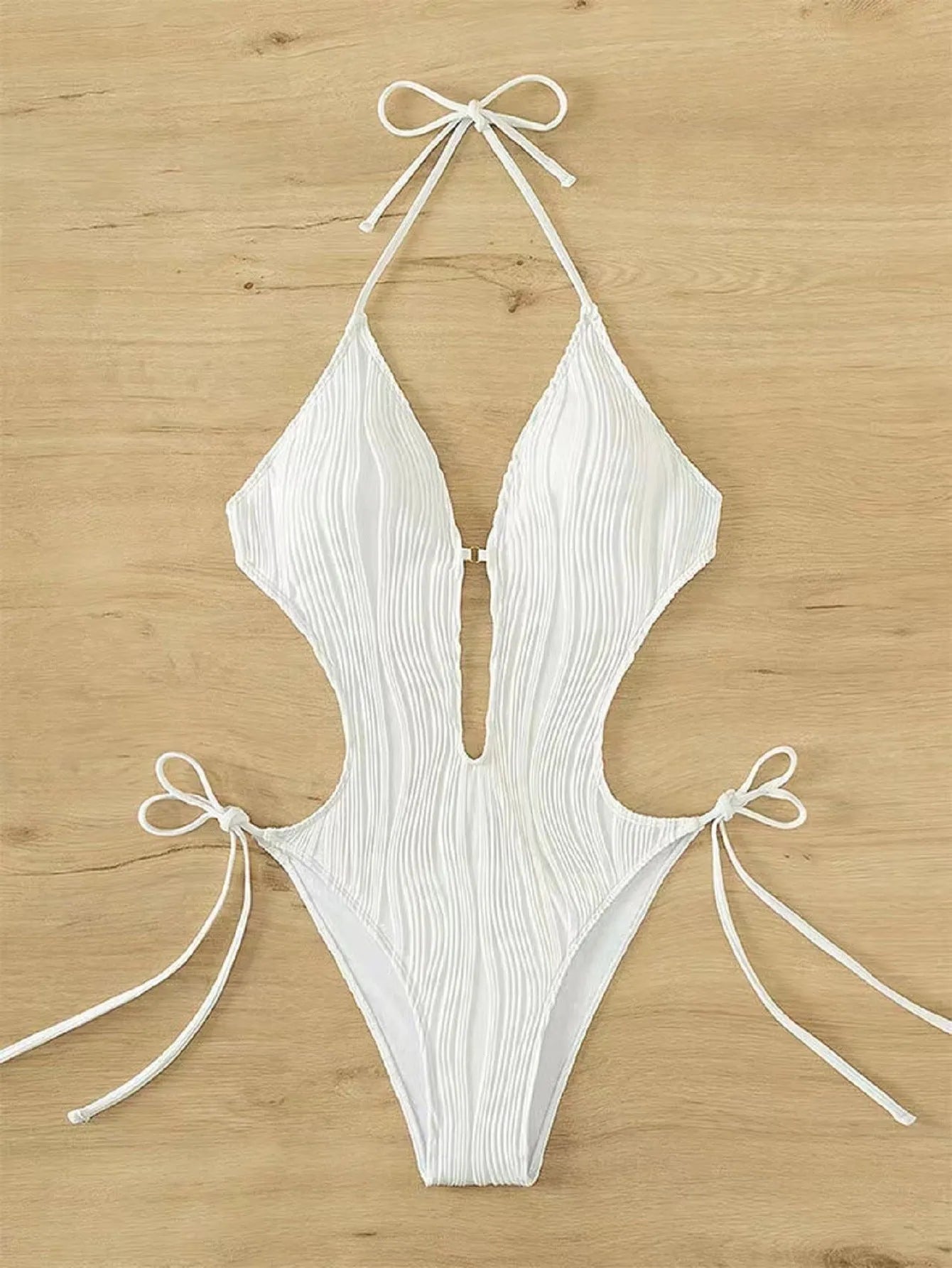 Women's black lace-up triangle bikini swimsuit with adjustable ties and solid colour design