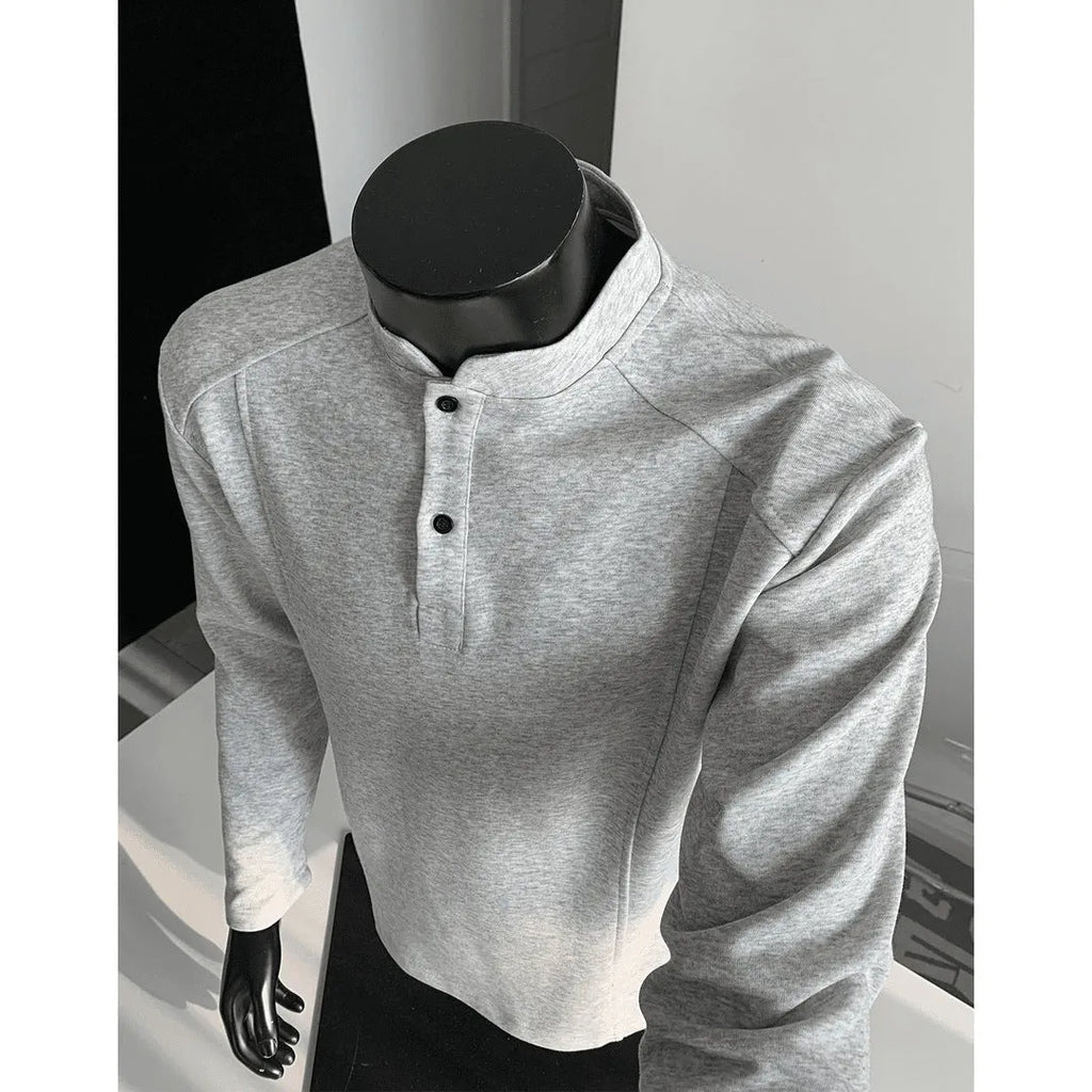 Men's loose-fit long-sleeve polo shirt with a stand-up collar and asymmetric patchwork design in Chinese cotton.