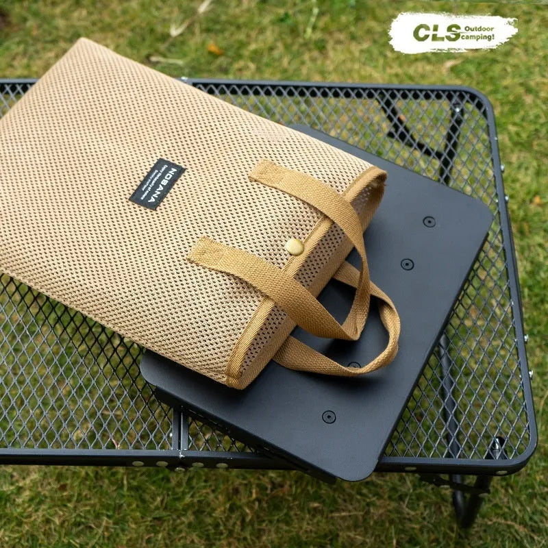 CLS aluminium dual-use camping stool shown in Army Green, folded and with storage bag.
