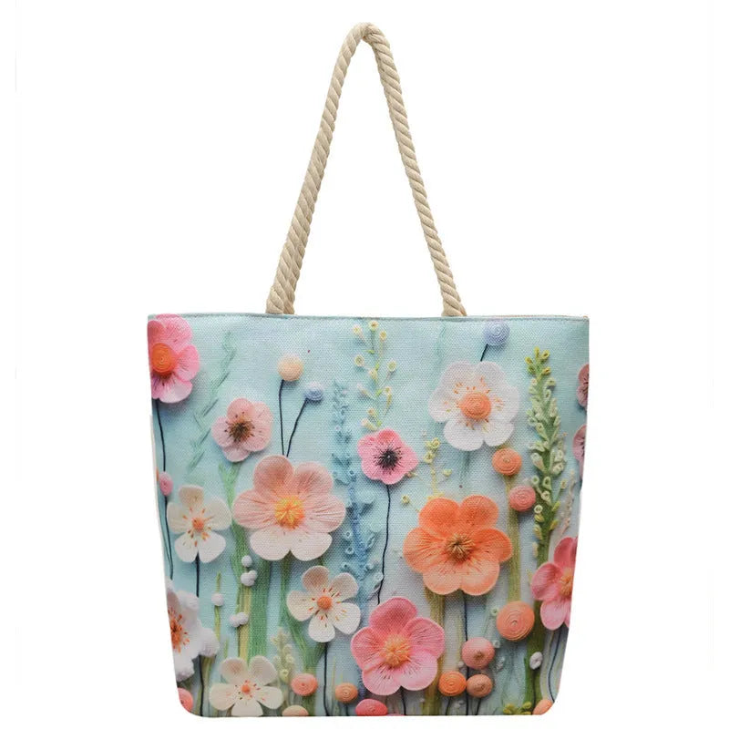 A soft cotton and linen string shoulder handbag with two straps and an open outer pocket.