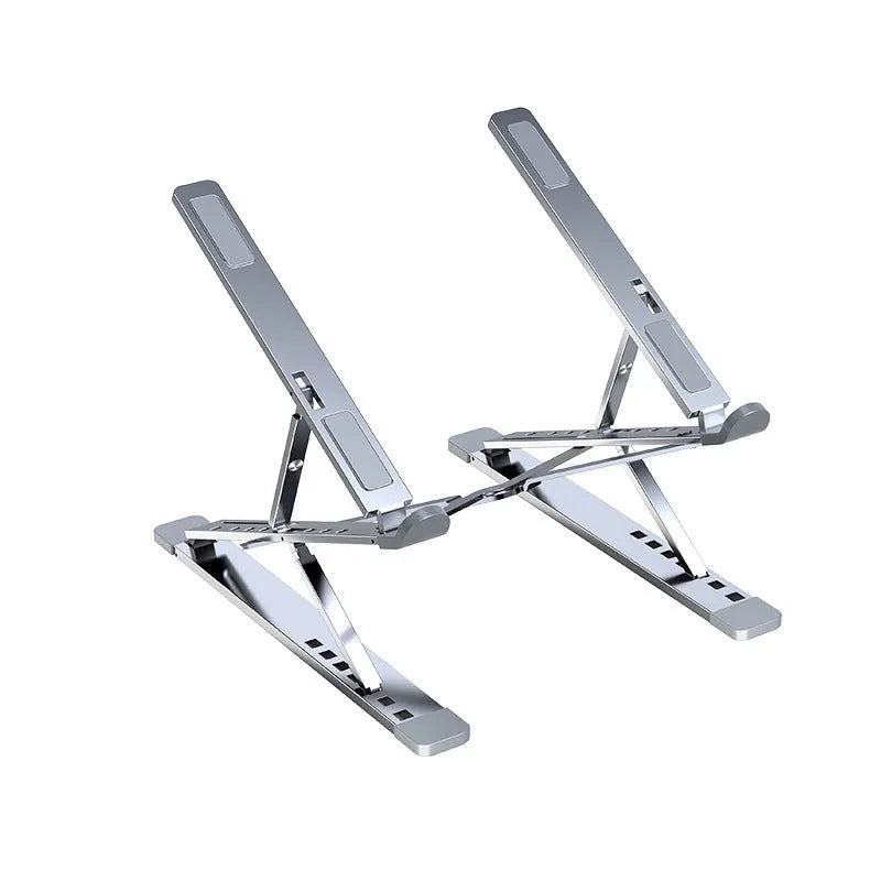 Folding aluminium computer stand bracket in grey with silicone pads on desktop surface
