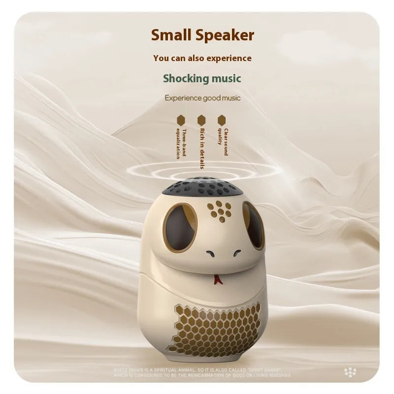 TK900 white wireless Bluetooth speaker with LED lights showing card slot and USB port