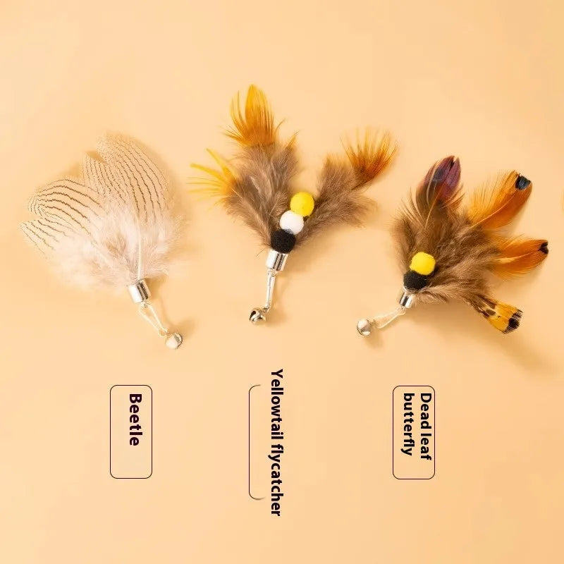 Three steel-wire flying insect-shaped cat toy replacement heads on a white background.