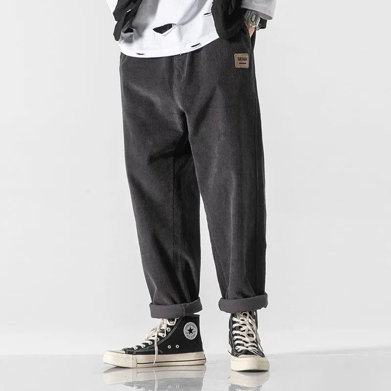 Men's loose straight corduroy sports trousers in Army Green colour with mid-waist design