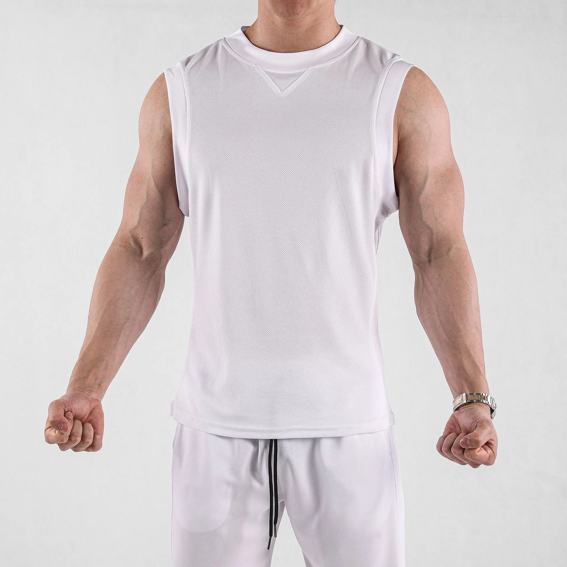 Men's loose fit quick-dry fitness vest in black and white, made from polyester blend fabric for summer sports.