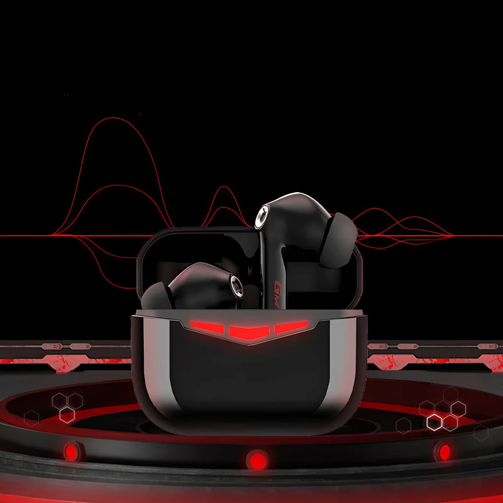 Black true wireless gaming earbuds and charging case with three pairs of silicone earmuffs on a grey background.