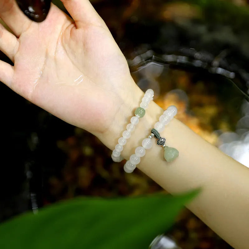 White agate and Hetian jade beads on a geometric S925 sterling silver lotus bracelet for women.