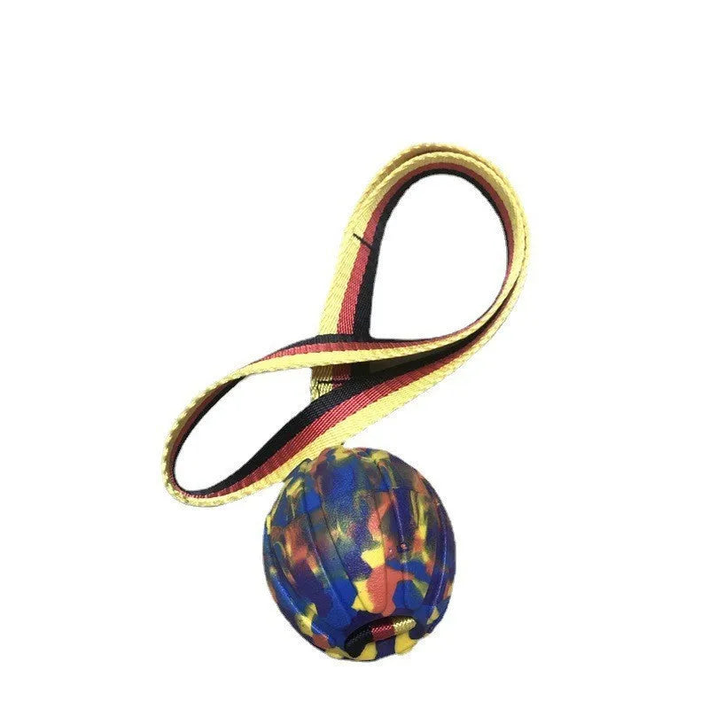 Floating EVA dog training ball with attached string in camouflage and yellow colours, showing three diameter sizes