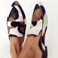 Women's black and white apricot suede shoes with imitation horse hair decoration and pointed toe