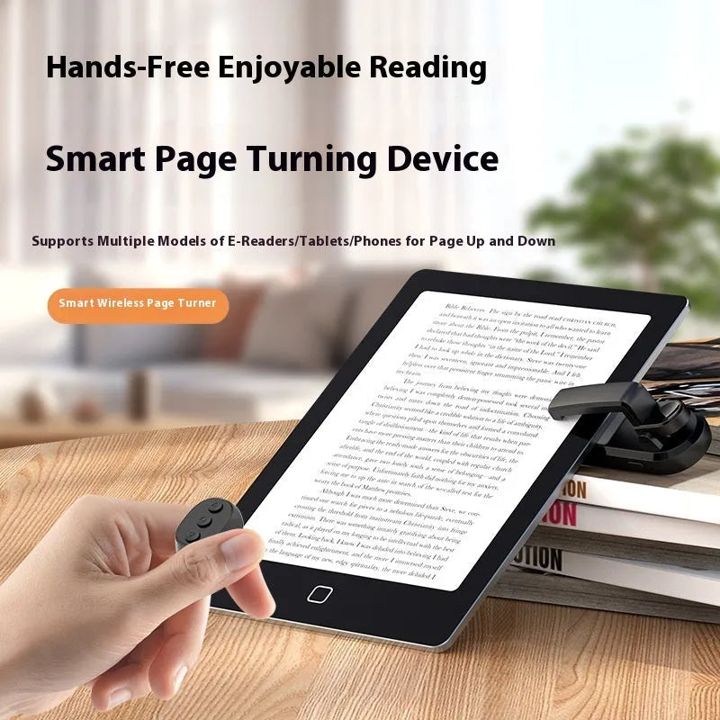 Black wireless page turner remote and clicker for tablets on a wooden table.