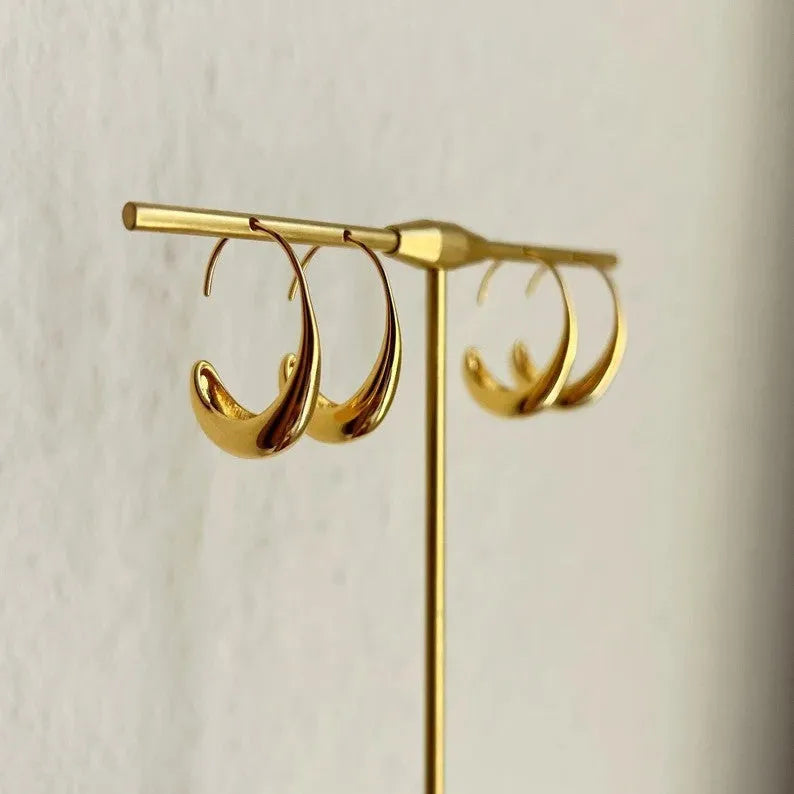 Gold and silver alloy earrings with snake design and electroplated finish