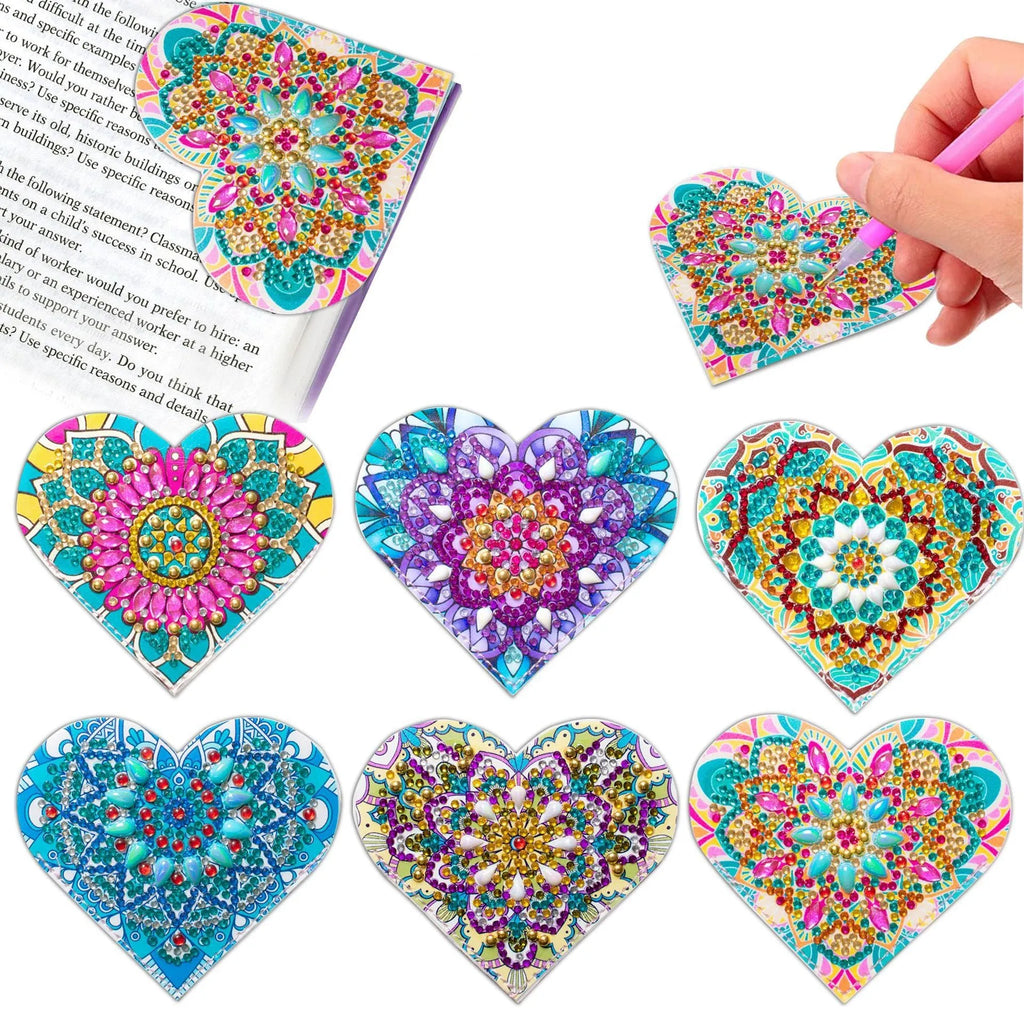 Set of six handmade leather bookmarks with crystal flower designs.