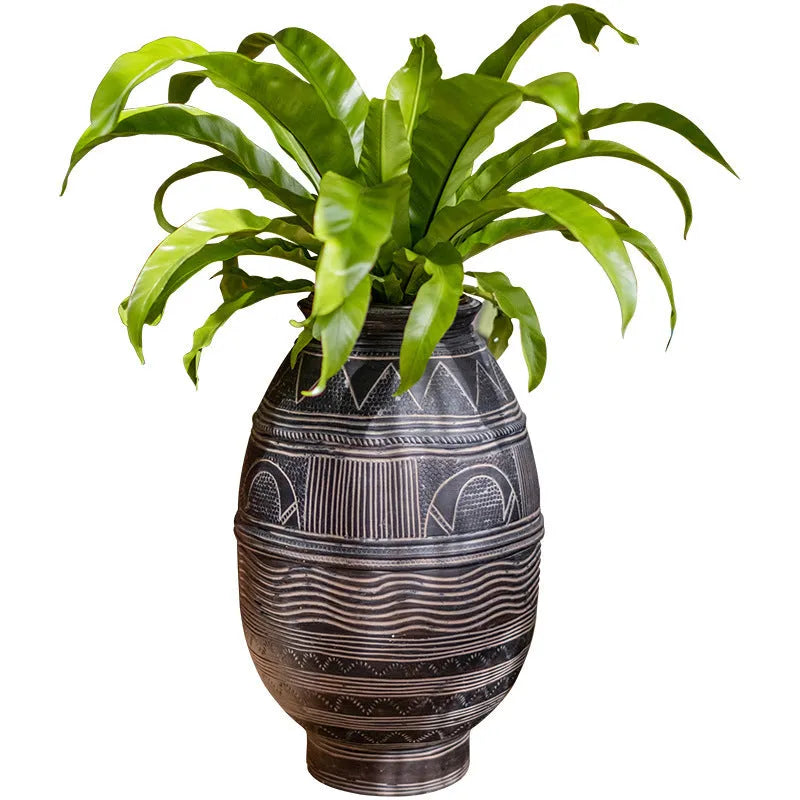 African art cement flower pot with textured finish and drainage holes for indoor outdoor plants