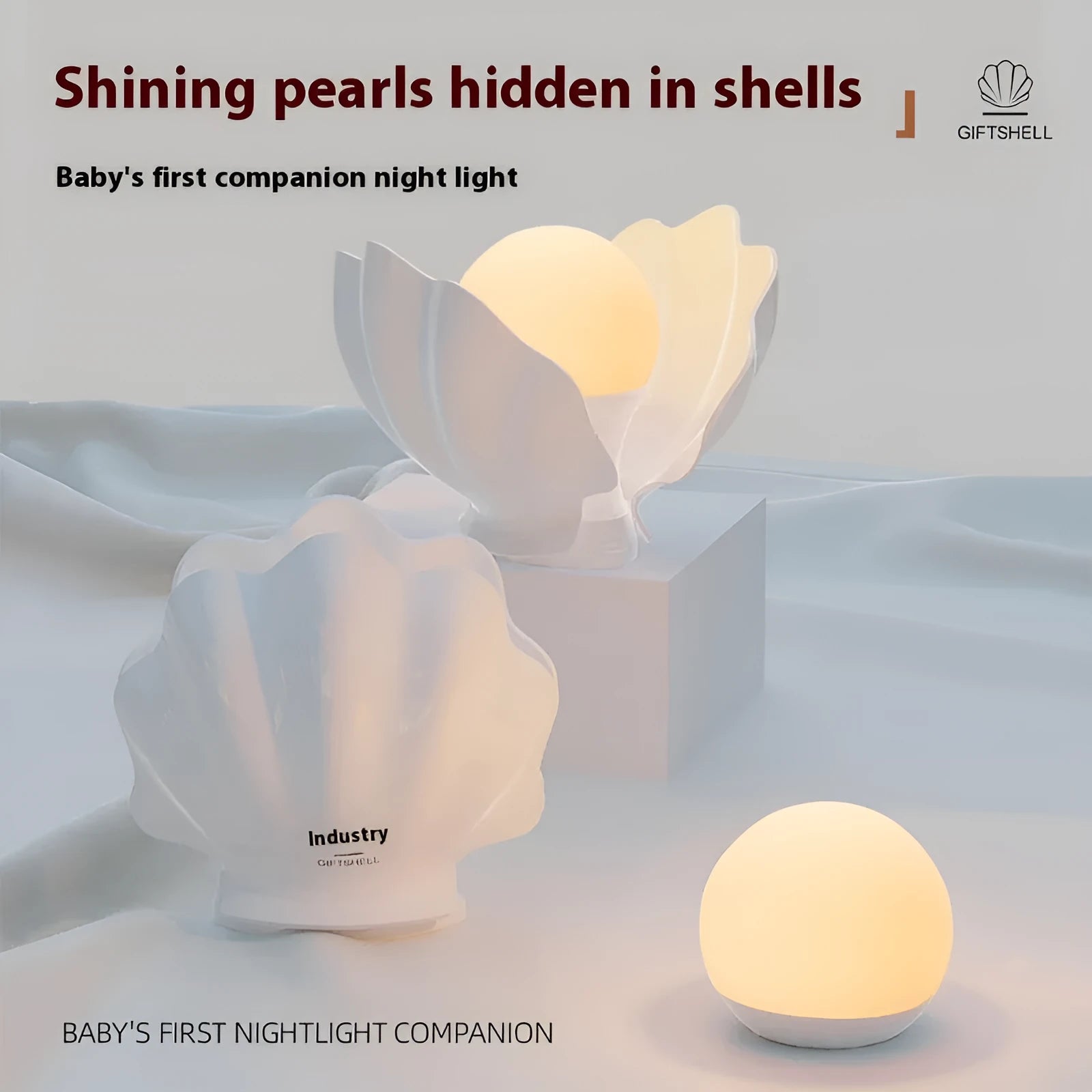 Shell pearl coloured silicone pat induction night light with power storage, disk shape 140x145x160 mm