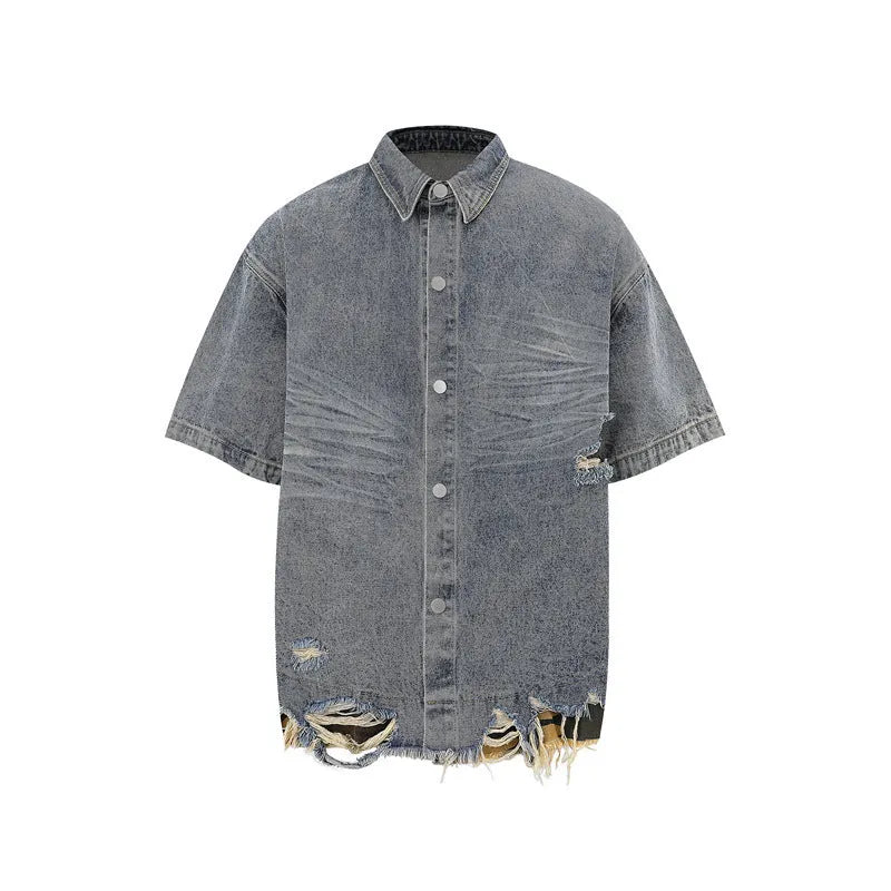 Leopard print denim short sleeve jacket and matching shorts set with raw cut edge stitching.