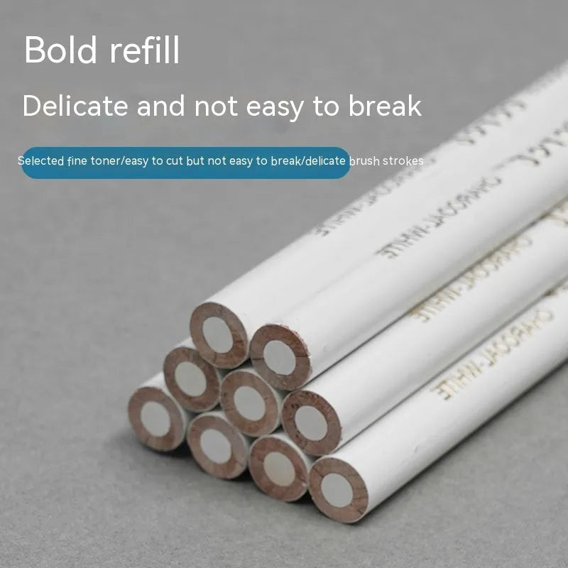 Set of three white charcoal pencils in wooden barrels for sketching on dark paper