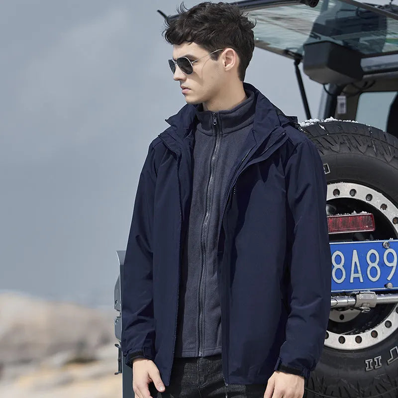 Men's black three-in-one mountaineering suit with removable lining, jacket and trousers set for outdoor sports.