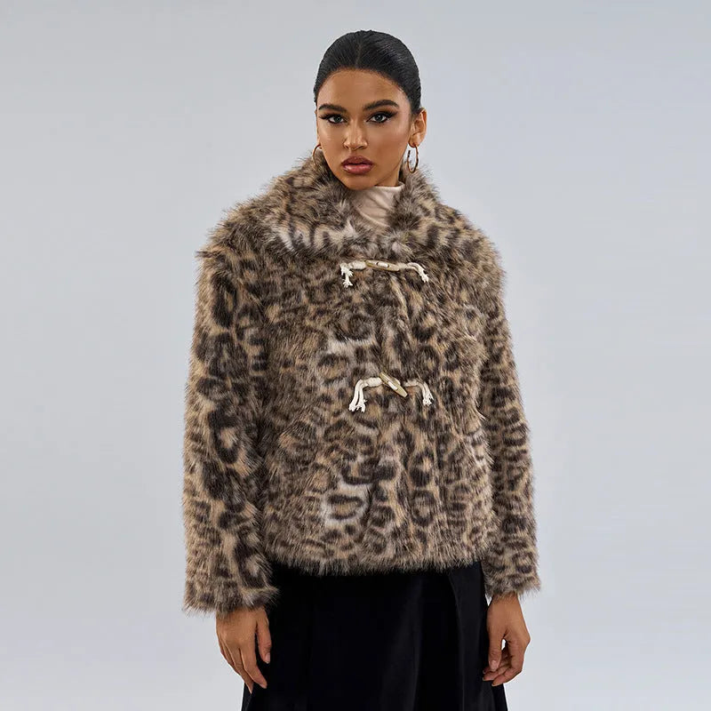 Women's leopard print polyester coat with a buckle lapel closure on a hanger.