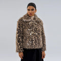 Women's leopard print polyester coat with a buckle lapel closure on a hanger.