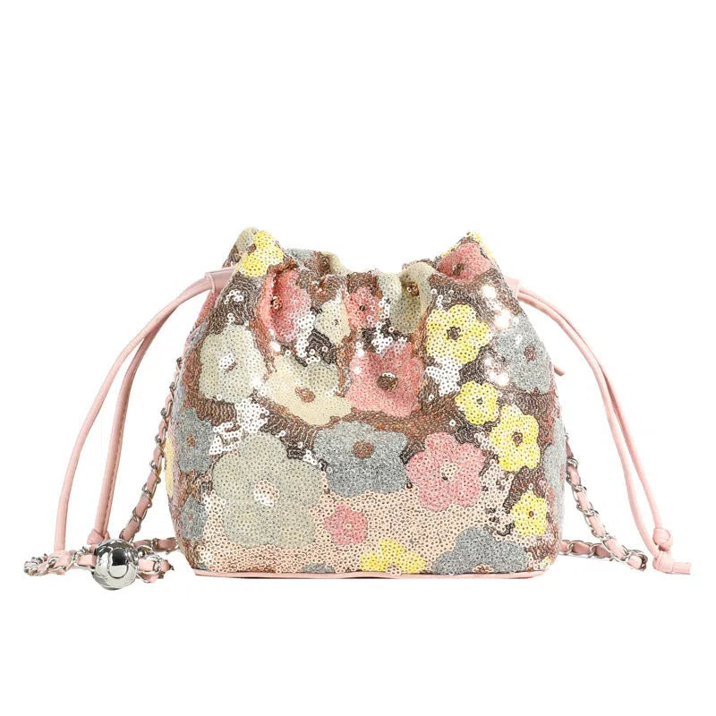 Bucket bag with mesh patchwork contrasting colours drawstring and chain strap in beige PVC material