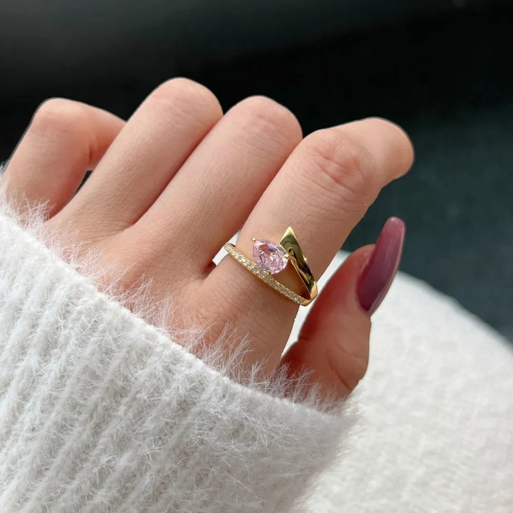 Women's silver water drop ring with electroplating and geometric teardrop design, shown in a listed colour option